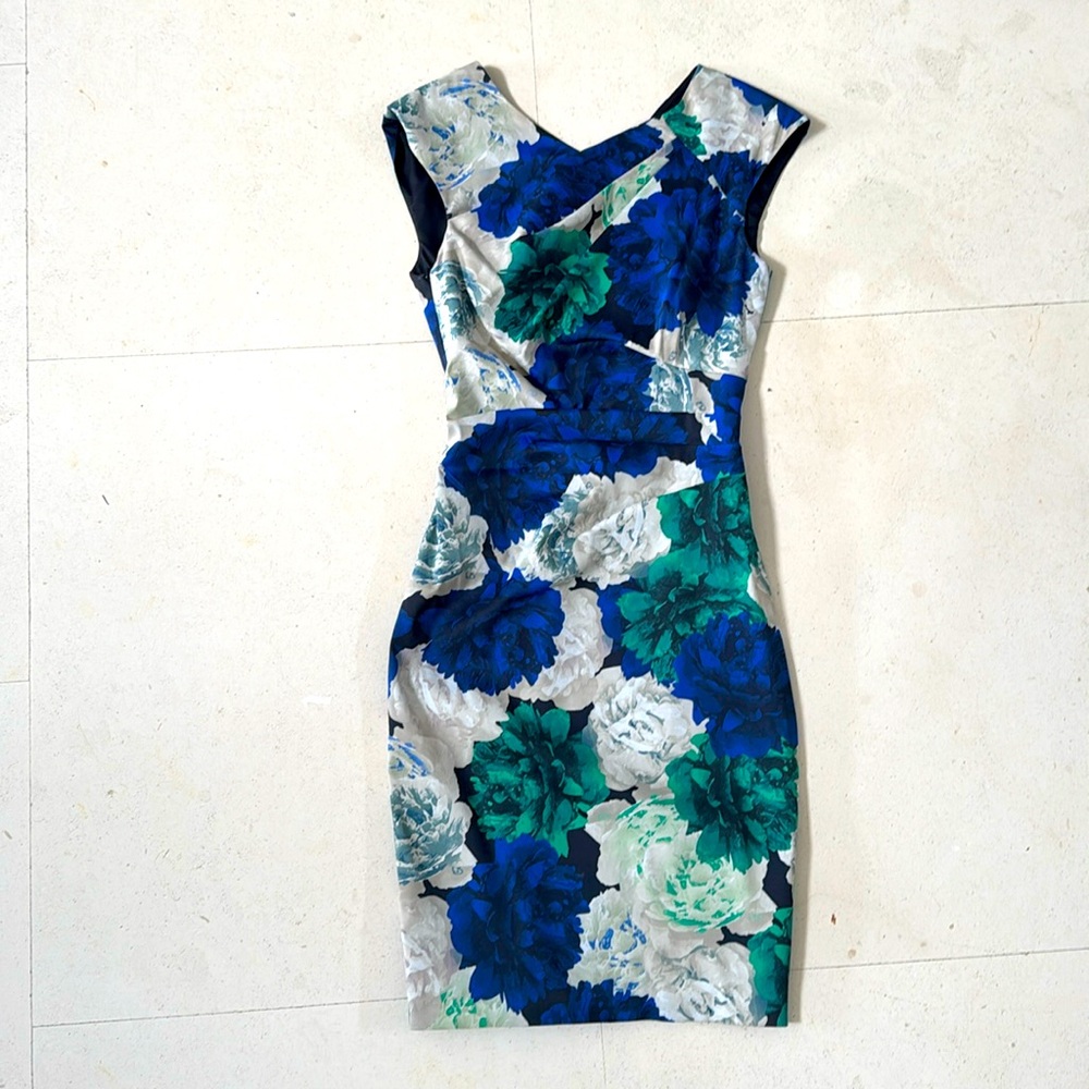 Floral snug fitting dress. Gently used three times. Like new!